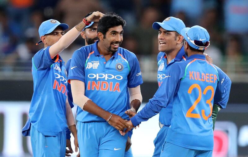 Dubai, United Arab Emirates - September 23, 2018: India's Jasprit Bumra takes the wicket of Pakistan's Shoaib Malik during the game between India and Pakistan in the Asia cup. Sunday, September 23rd, 2018 at Sports City, Dubai. Chris Whiteoak / The National