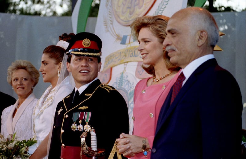 King Hussein, right, and his wife Queen Noor, second from right, attend the marriage of his eldest son Abdullah and Rania Al-Yassin, centre. On the far left is Abdullah's mother, Hussein's ex-wife Princess Muna Al-Hussein, born Antoinette Gardiner. Photo: FMS