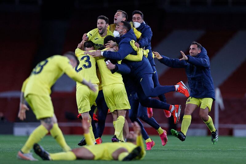 Villarreal players celebrate after the Uefa Europa League semi-final, second leg football match between Arsenal and Villarreal at the Emirates Stadium in London. Villareal advanced to the final. AFP