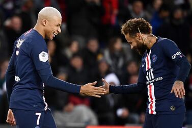 Paris Saint-Germain's Kylian Mbappe, left, and Neymar, two of the biggest transfers fees in football history. AFP