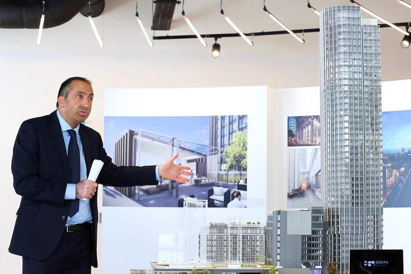 George Kyriacou, the managing director for developments at CIT, presents a model of the South Bank Tower development in London. Stephen Lock for The National