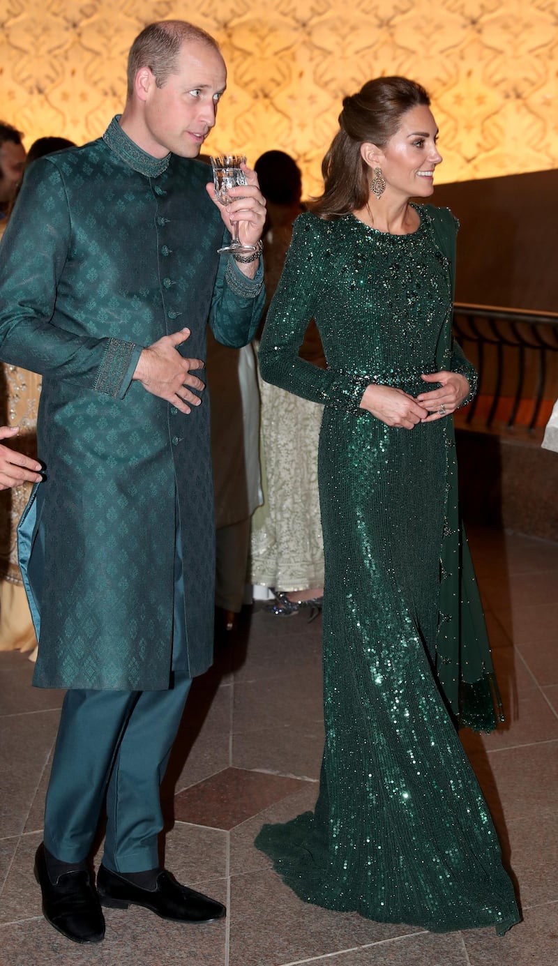Britain's Prince William and Catherine, Duchess of Cambridge, attend a reception hosted by the British High Commissioner to Pakistan, Thomas Drew, at the Pakistan National Monument in Islamabad, Pakistan. REUTERS
