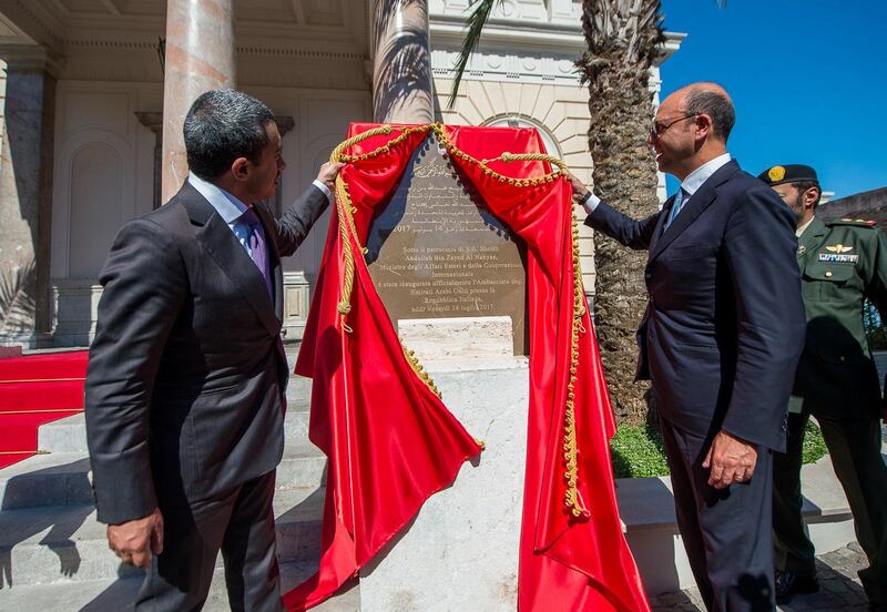Sheikh Abdullah bin Zayed, Minister of Foreign Affairs and International Cooperation, and his Italian counterpart, Angelino Alfano, reveal the commemorative plaque for the UAE Embassy headquarters in Rome. Wam