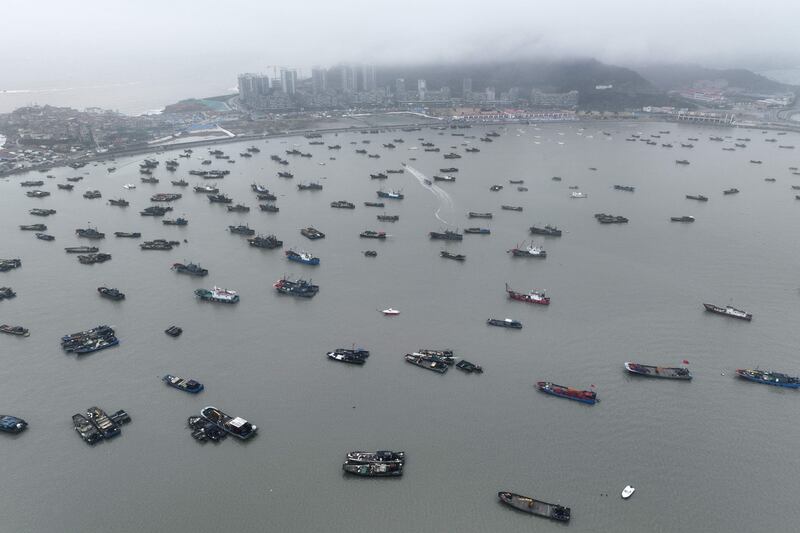 An aerial view of fishing boats in the harbour in Lianyungang, China. Boats were ordered back to port after a yellow warning was issued for cold weather and high winds. AFP