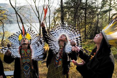 Indigenous people from Brazil lead a 'rainforest blessing' at the Cormonachan community woodlands in Argyll to coincide with Cop26 at the invitation of the Alliance for Scotland's Rainforest. Photo: Harper Collins