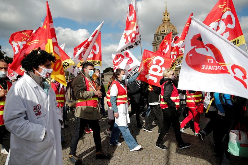 French health workers march through Paris. Reuters