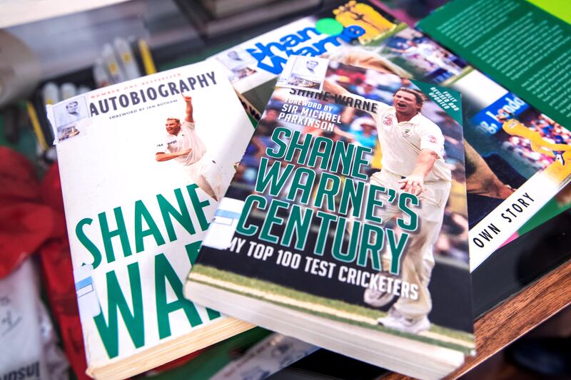 Shayam Bhatia's book collection, including several penned by late Australian cricketer Shane Warne, on display at his private museum in Dubai. 