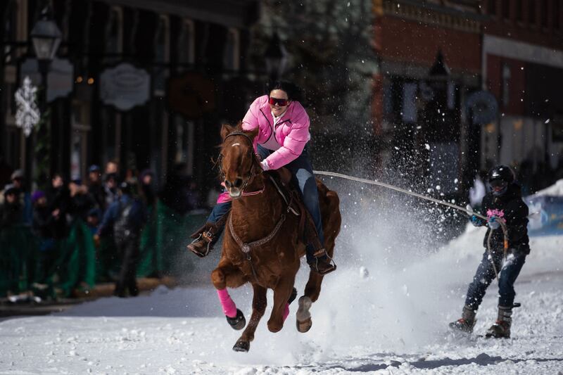 Action from the 75th annual Leadville Ski Joring competition in Colorado. AFP
