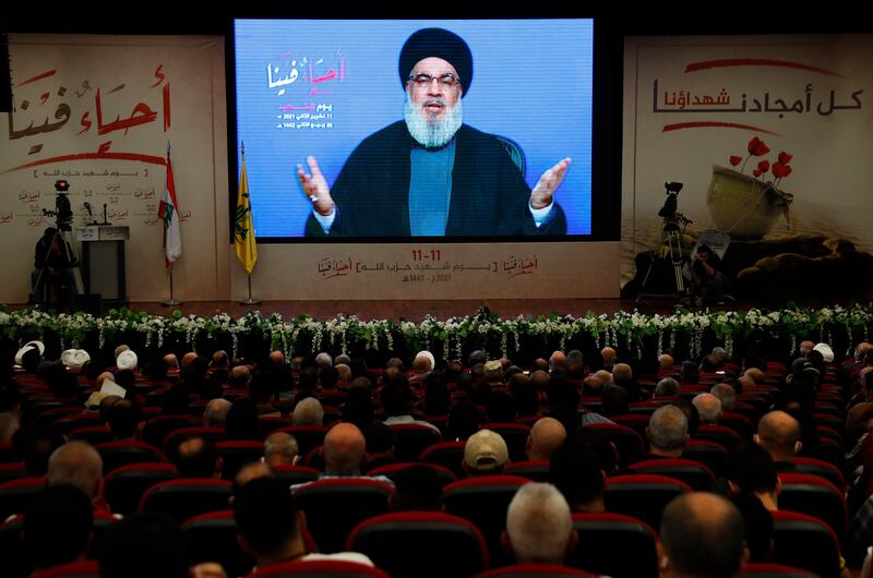 Hezbollah leader Hassan Nasrallah speaks via video link, during a rally marking Hezbollah Martyrs Day, in Beirut, Lebanon. Photo: AP