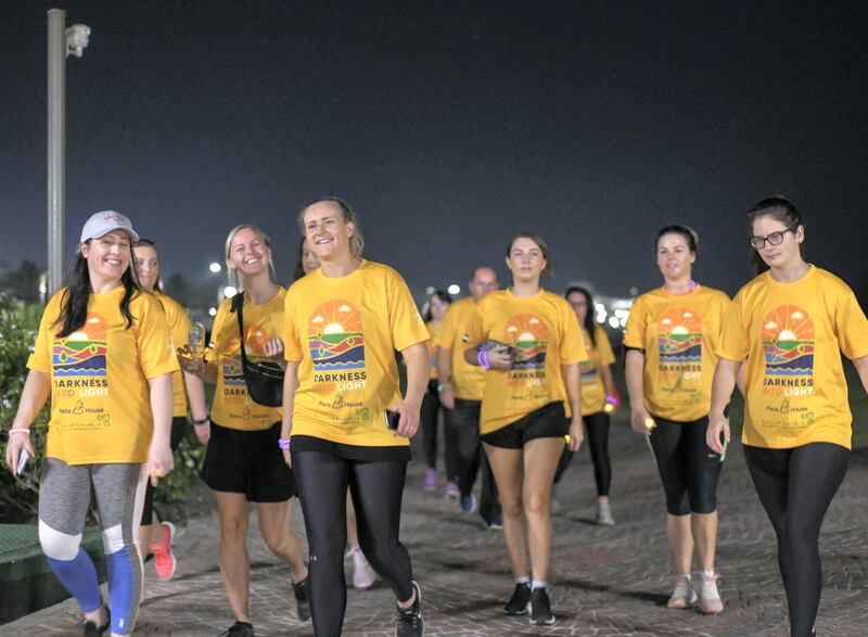 Abu Dhabi, United Arab Emirates - This year 1,700 people took part in the ÔDarkness into LightÕ walk at Emirates Palace. Khushnum Bhandari for The National