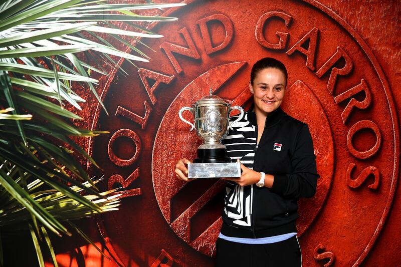 PARIS, FRANCE - JUNE 08: Ashleigh Barty of Australia celebrates victory with the trophy following the ladies singles final against Marketa Vondrousova of The Czech Republic during Day fourteen of the 2019 French Open at Roland Garros on June 08, 2019 in Paris, France. (Photo by Clive Brunskill/Getty Images)