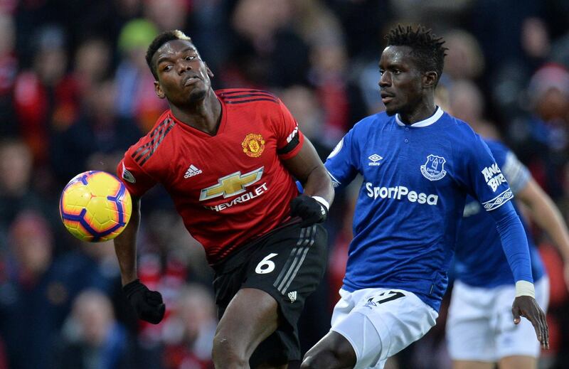 Pogba in action with Everton's Idrissa Gueye. Reuters