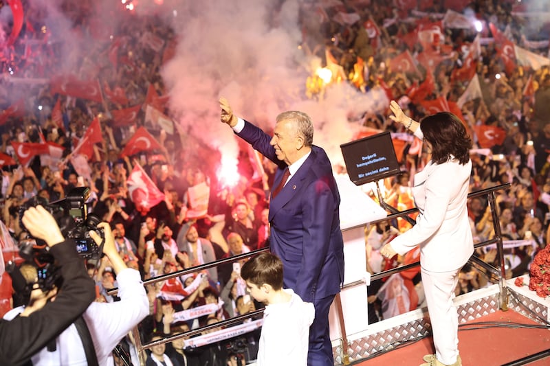 Ankara's Mayor and Republican People's Party candidate Mansur Yavas, waves to supporters in Ankara. AFP