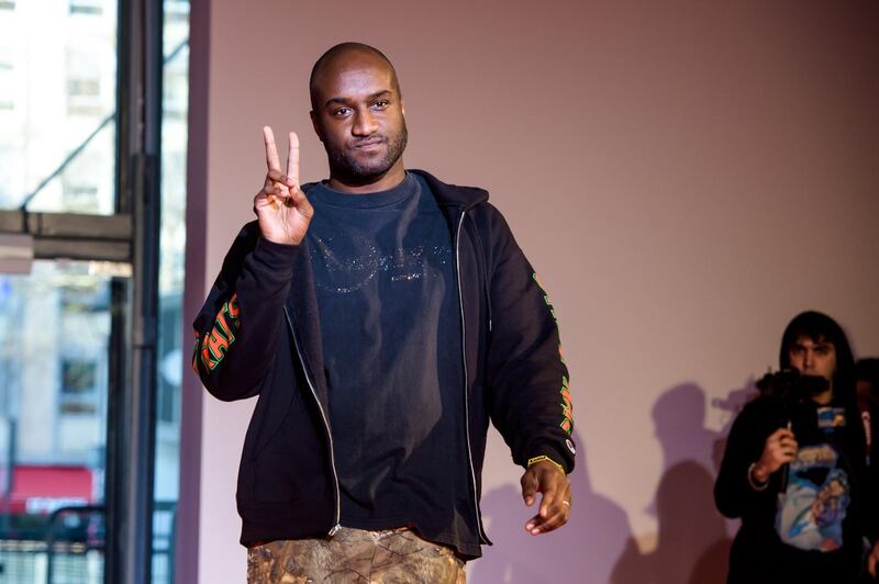 epa06630142 (FILE) - US designer Virgil Abloh appears on the runway after the presentation of his Off-White Fall/Winter 2018/19 Men's collection during the Paris Fashion Week, in Paris, France, 17 January 2018 (reissued 26 March 2018). French label Louis Vuitton on 26 March 2018 announced it had named Virgil Abloh as its first black artistic director.  EPA/CHRISTOPHE PETIT TESSON *** Local Caption *** 54017480