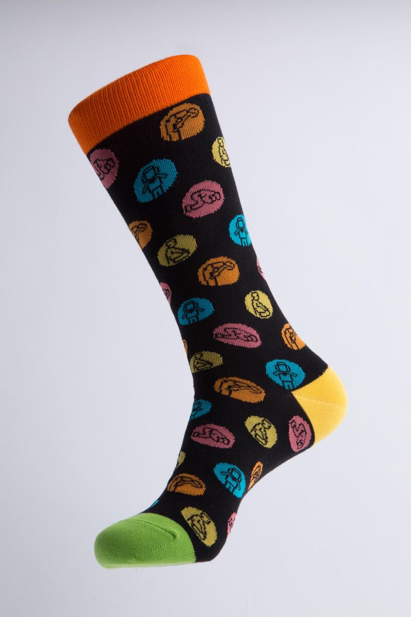 The Prayer sock: “We transformed the polka-dot pattern by inserting prayer positions in each dot. This design is in keeping with our Unity collection, as the essence of prayer is to connect with a higher power.”