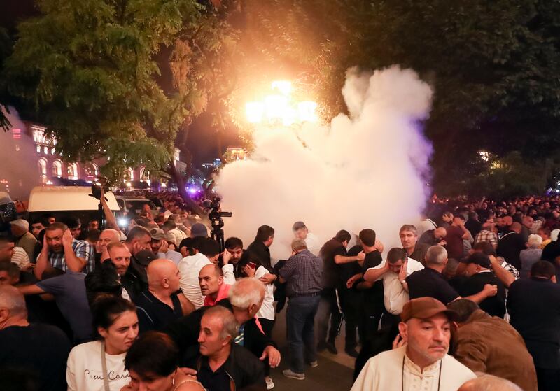 Demonstrators clash with police outside the Armenia government offices in Yerevan, the capital of Nagorno-Karabakh. AP