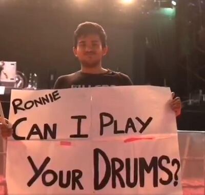 A fan of The Killers shows the sign that caught the attention of the band's front man, Brandon Flowers. 