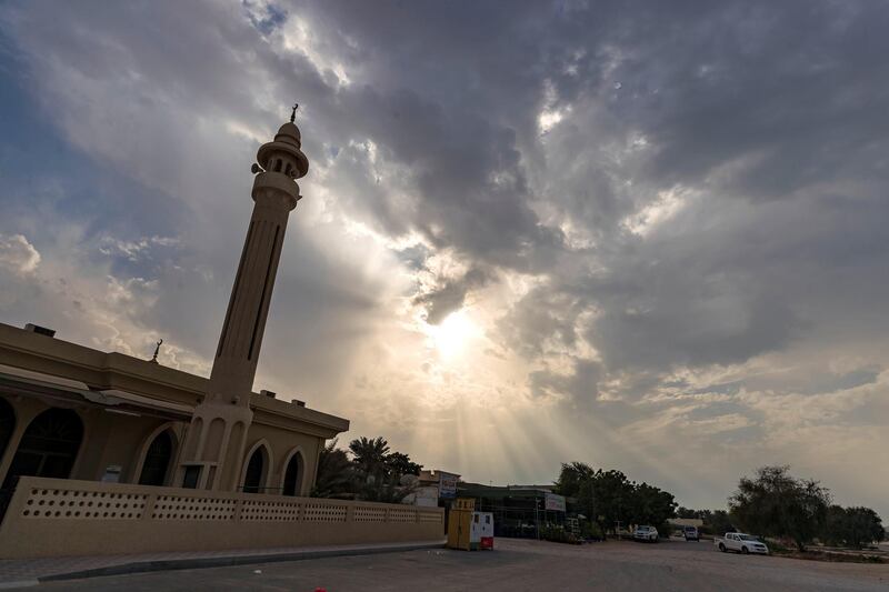 Ras Al Khaimah, United Arab Emirates - November 25, 2018: A dramatic sky over a mosque in Ras Al Khaimah. Sunday the 25th of November 2018 in Ras Al Khaimah. Chris Whiteoak / The National