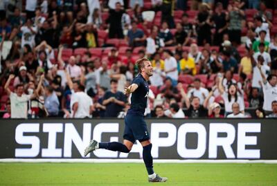 epa07731396 Tottenham's Harry Kane celebrates after scoring the 3-2 lead during the International Champions Cup (ICC) soccer match between Juventus FC and Tottenham Hotspur at the National Stadium in Singapore, 21 July 2019.  EPA/WALLACE WOON