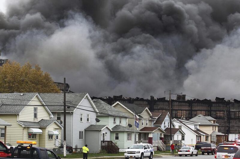 Smoke rises from a fire at a former Bethlehem Steel site in Lackawanna, New York. Jeffrey T Barnes / AP Photo