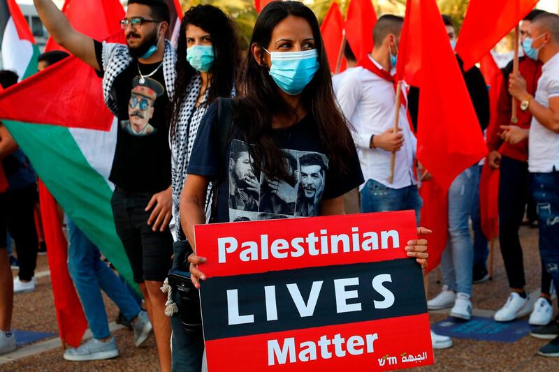 Protesters gather in Tel Aviv's Rabin Square on June 6, 2020, to denounce Israel's plan to annex parts of the occupied West Bank. AFP