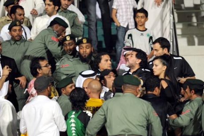 Al Wasl's coach Maradona a fight with fans during the match, Al Wasl VS Al Shabab club team in Dubai - photos by:  Ashraf Al Amra, 29/03/2012