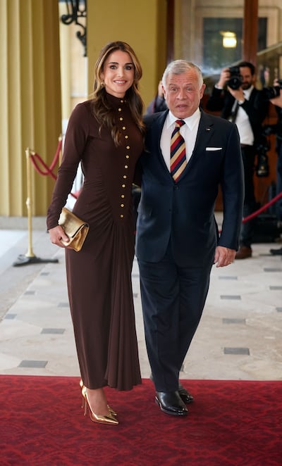 King Abdullah II of Jordan and his wife Queen Rania at Buckingham Palace. PA 