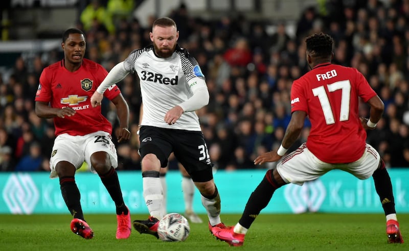 Derby's Wayne Rooney on the ball. AP