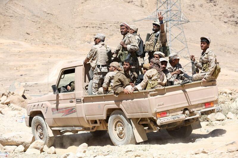 Pro-government Yemeni soldiers ride on the back of a truck in the liberated area of Fardhat Nahm, around 60 kilometres from the capital, Sanaa, on February 20, 2016. Ali Owidha/Reuters