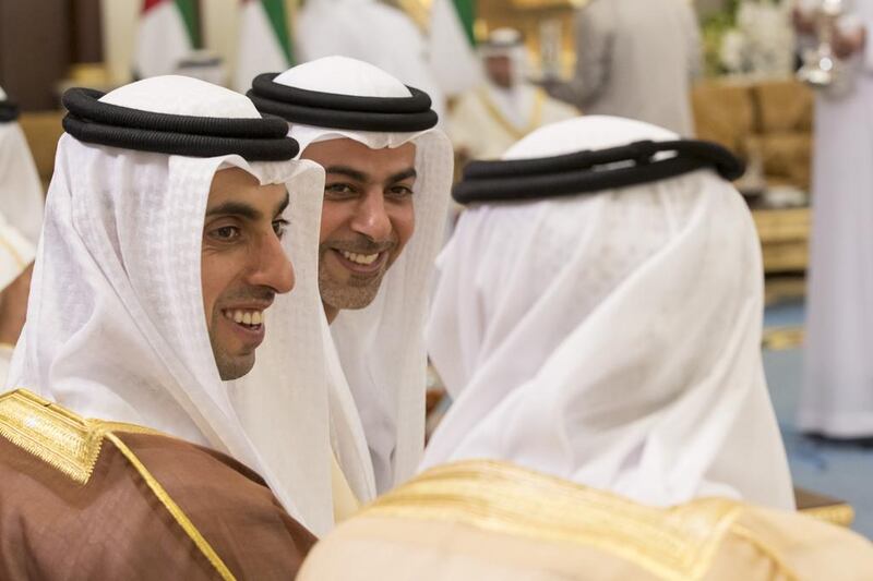 Sheikh Khaled bin Zayed Al Nahyan, Chairman of the Board of Zayed Higher Organization for Humanitarian Care and Special Needs, left, and Sheikh Omar bin Zayed Al Nahyan, Deputy Chairman of the Board of Trustees of Zayed bin Sultan Al Nahyan Charitable and Humanitarian Foundation, second left, at Mushrif Palace. Mohamed Al Hammadi / Crown Prince Court - Abu Dhabi