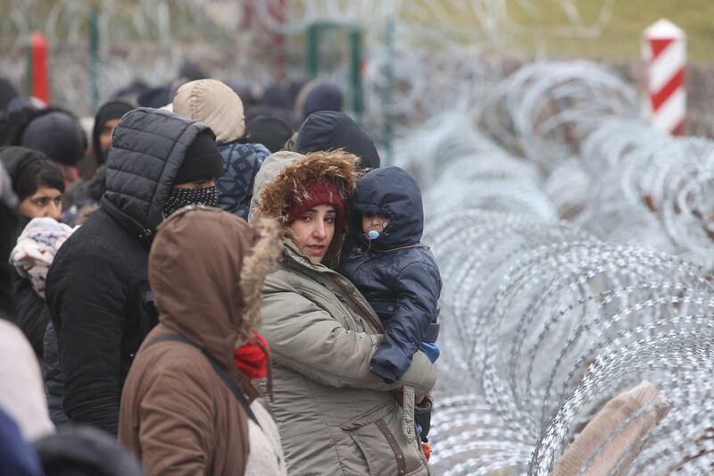 Migrants gather at the Bruzgi-Kuznica border crossing. AFP