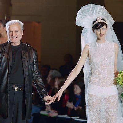 Stella Tennant with designer Gianni Versace, for the spring 1996 haute couture collection for Versace. Getty Images
