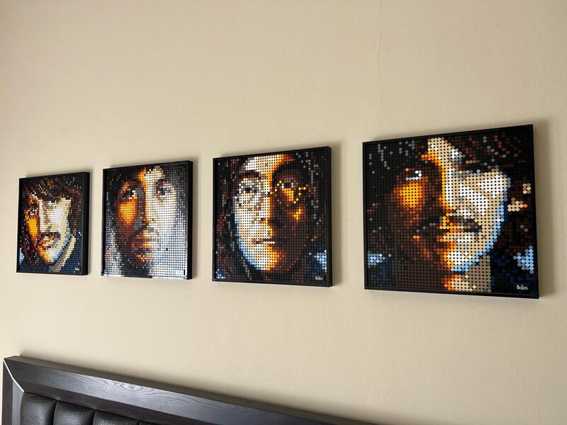 Lego artworks of The Beatles dominate one wall