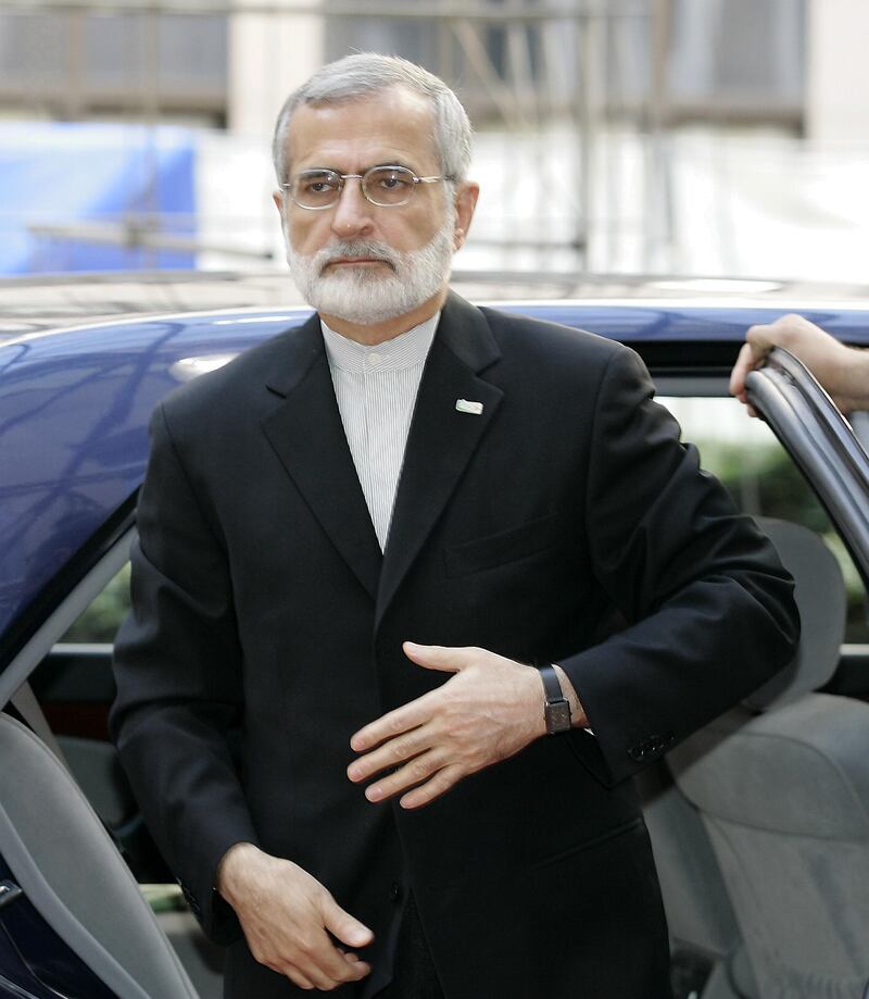 Iranian Foreign Minister Kamal Kharazi arrives at the European Union headquarters in Brussels 22 June 2005 for an international conference on Iraq.  Iraqi Prime Minister Ibrahim Jaafari vowed Wednesday that his country's forces would in time "take over the tasks which are down to them" from foreign troops whose presence he stressed was "provisional."  "We want the presence of multinational forces in Iraq to be provisional, and our own forces to take over the tasks which are down to them," he said at the start of an international conference on his violence-torn country. AFP  PHOTO GERARD CERLES / AFP PHOTO / GERARD CERLES