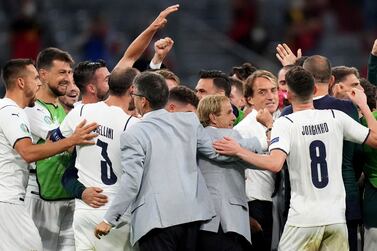 Italian players and Italy's manager Roberto Mancini, right, celebrate winning the Euro 2020 soccer championship quarterfinal match between Belgium and Italy at the Allianz Arena stadium in Munich, Germany, Friday, July 2, 2021.  (AP Photo / Matthias Schrader, Pool)