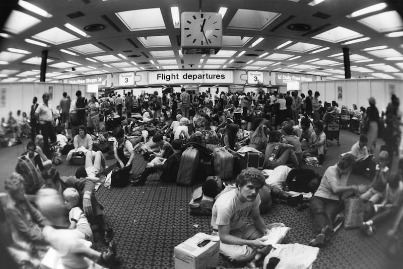 Holiday-makers waiting in the departure lounge at Terminal 3 of Heathrow in 1981.