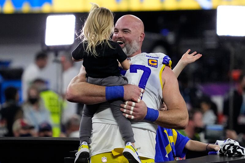 Los Angeles Rams offensive tackle Andrew Whitworth hold his daughter after the NFL Super Bowl. AP Photo