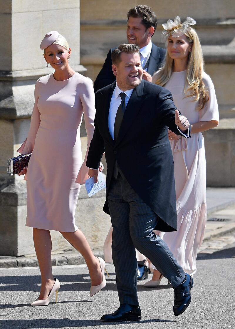 James Corden and his wife Julia Carey arrive for the wedding ceremony of Prince Harry and Meghan Markle at St. George's Chapel in Windsor Castle in Windsor. Toby Melville / AP Photo