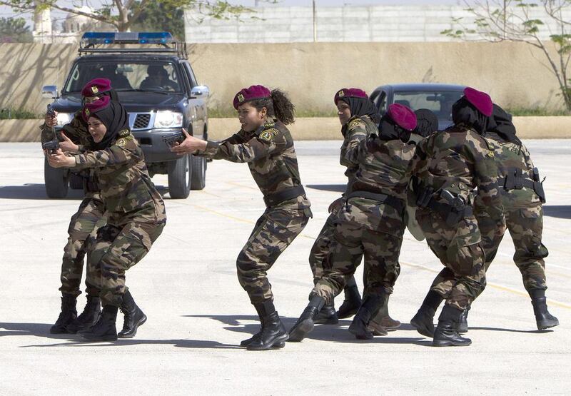 The trainees had responded to ads announcing the guards wanted recruits, but faced a tough selection process, with only a few dozen of the tallest and fittest being chosen. Ahmad Gharabli / AFP