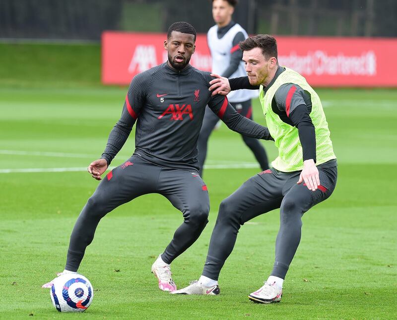KIRKBY, ENGLAND - APRIL 28:(THE SUN OIUT. THE SUN ON SUNDAY OUT) Georginio Wijnaldum and Andy Robertson of Liverpool during a training session at AXA Training Centre on April 28, 2021 in Kirkby, England. (Photo by John Powell/Liverpool FC via Getty Images)