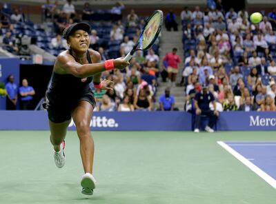 Naomi Osaka, of Japan, returns a shot to Madison Keys, during the semifinals of the U.S. Open tennis tournament, Thursday, Sept. 6, 2018, in New York. (AP Photo/Seth Wenig)