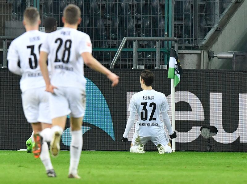 Borussia's Florian Neuhaus,celebrates after scoring his team's third goal. AP
