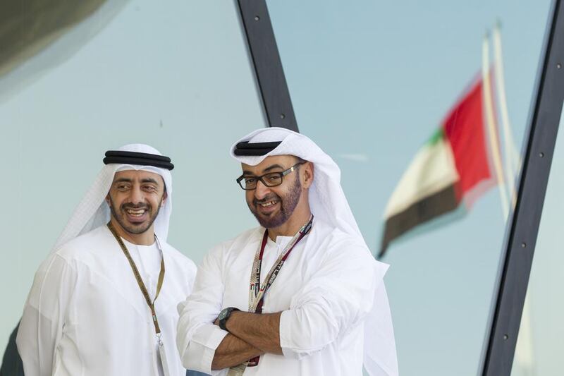 Sheikh Abdullah bin Zayed, Minister of Foreign Affairs, left, and Sheikh Mohammed, at the Formula 1 Etihad Airways Abu Dhabi Grand Prix. Ryan Carter / Crown Prince Court — Abu Dhabi