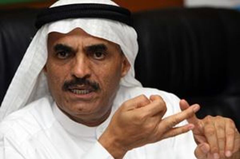 Dr Abdullah al Nuaimi, the general secretary of Tennis Emirates, is eager to raise the reputation of the sport in the UAE, which hosts the Dubai Open, won by Novak Djokovic, below, last year.