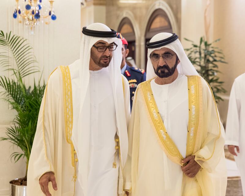 ABU DHABI, UNITED ARAB EMIRATES - June 25, 2017: HH Sheikh Mohamed bin Zayed Al Nahyan, Crown Prince of Abu Dhabi and Deputy Supreme Commander of the UAE Armed Forces (L), speaks with HH Sheikh Mohamed bin Rashid Al Maktoum, Vice-President, Prime Minister of the UAE, Ruler of Dubai and Minister of Defence (R), during an Eid Al Fitr reception at Mushrif Palace. 
( Ryan Carter / Crown Prince Court - Abu Dhabi )
--- *** Local Caption ***  20170625RC_C169182.jpg