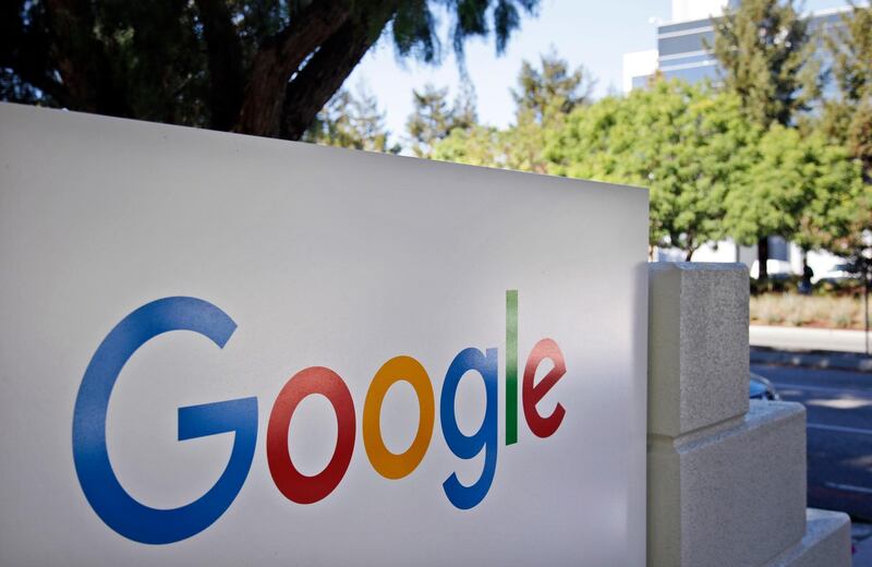 CORRECTS TO A GROUP OF 35 STATES AS WELL AS THE DISTRICT OF COLUMBIA AND TERRITORIES OF GUAM AND PUERTO RICO FILED, INSTEAD OF 38 STATES FILE - This Oct. 20, 2015, file photo, shows signage outside Google headquarters in Mountain View, Calif. A group of 35 states as well as the District of Columbia and the territories of Guam and Puerto Rico filed an anti-trust lawsuit against Google on Thursday, Dec. 17, 2020, alleging that the search giant has an illegal monopoly over the online search market that hurts consumers and advertisers. The lawsuit, announced by Colorado Attorney General Phil Weiser, was filed in federal court in Washington, D.C. by states represented by bipartisan attorneys general. (AP Photo/Marcio Jose Sanchez, File)