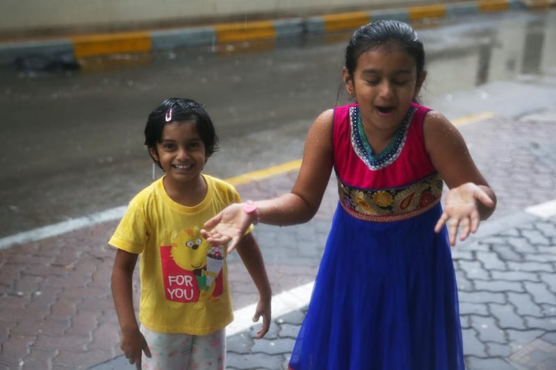 While the rain and winds caused major damage they brought smiles of glee for some of the younger residents of Abu Dhabi. Delores Johnson / The National