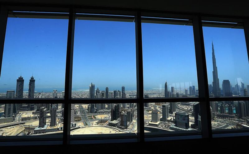 View of Burj Khalifa and Business Bay area from the Ubora Commercial Tower in Dubai. Satish Kumar / The National