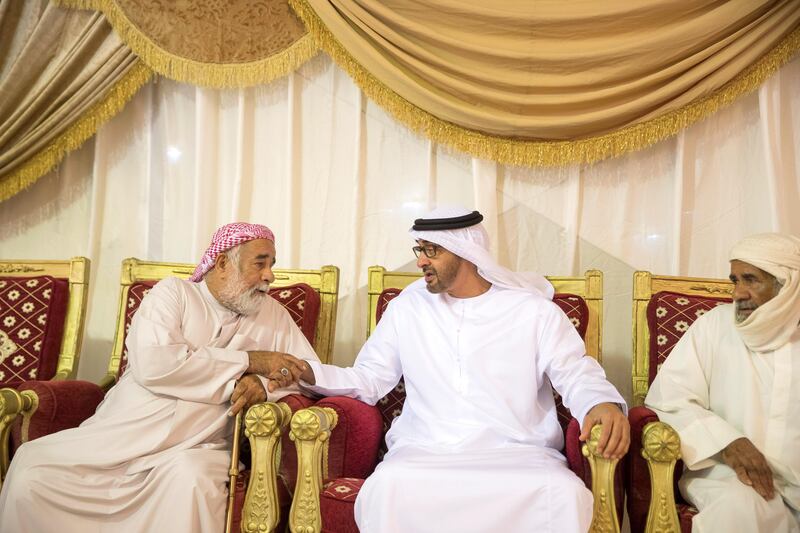 FUJAIRAH, UNITED ARAB EMIRATES - August 13, 2017: HH Sheikh Mohamed bin Zayed Al Nahyan, Crown Prince of Abu Dhabi and Deputy Supreme Commander of the UAE Armed Forces (C), offers condolences to the family of martyr Mohamed Rashed Al Hassani, who passed away while serving with the UAE Armed Forces in Yemen.

( Mohamed Al Hammadi / Crown Prince Court - Abu Dhabi )
---