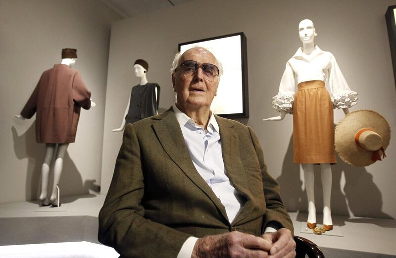 French designer Hubert de Givenchy poses in front of his creations during an interview on his exhibition 'Hubert de Givenchy' at the Thyssen-Bornemisza Museum in Madrid, Spain, 17 October 2014. de Givenchy, who founded the fashion house of Givenchy in 1952, died on 10 March 2018. He was 91. EPA